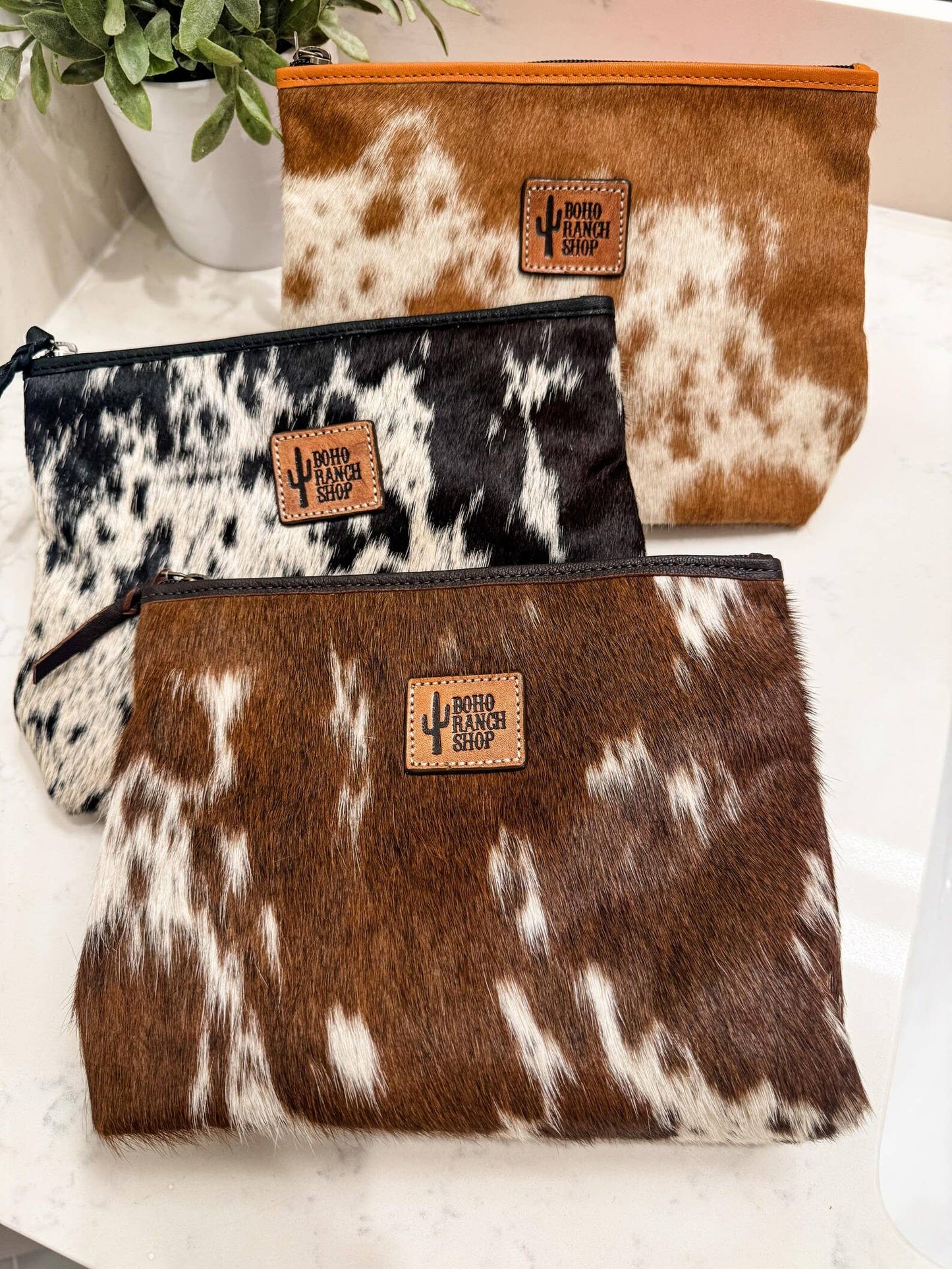 NEON LEAPORD PRINT COWHIDE MAKEUP BAG