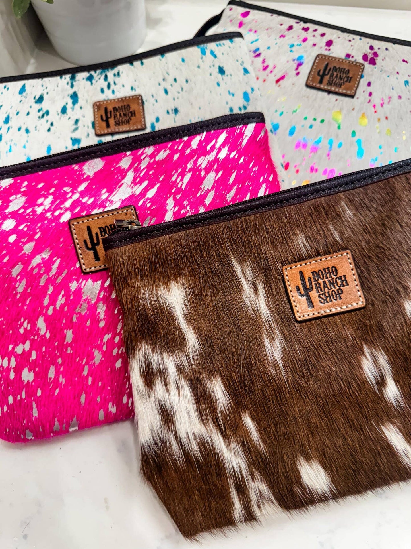 NEON LEAPORD PRINT COWHIDE MAKEUP BAG